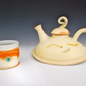 Cream Teapot with Tea Cup